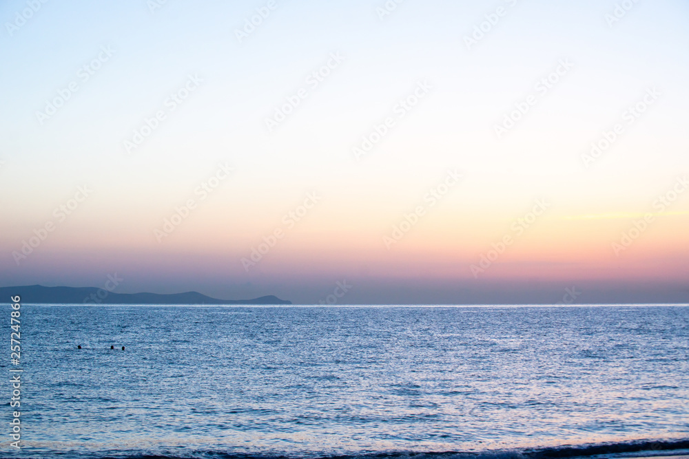Fototapeta premium Early summer morning bright sky Beach in Crete