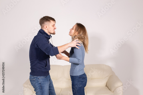 People, violence and abuse concept - Man and woman fighting