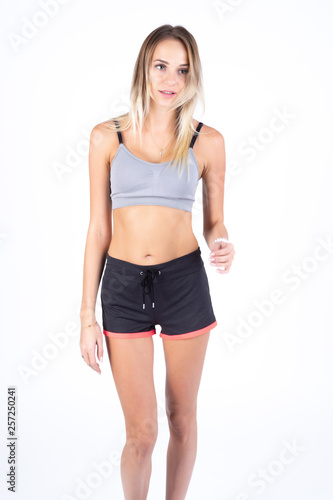 athletic girl standing in the studio