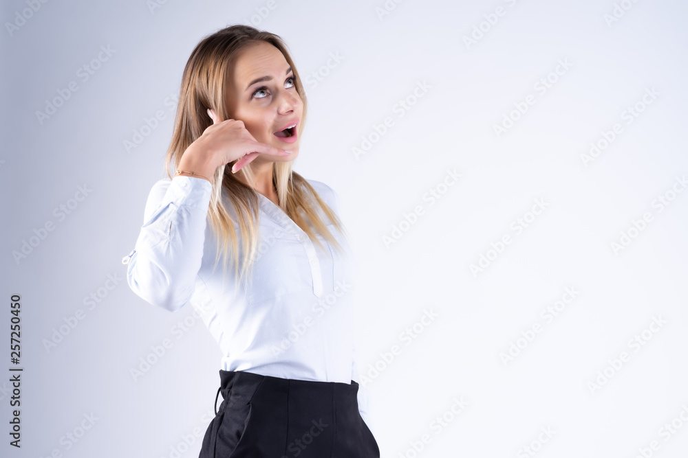 Businesswoman with hand show with call me sign Businesswoman with hand show with call me sign