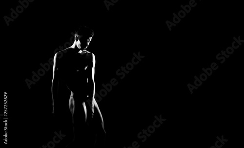 Black and white silhouette of male ballet dancer. Long monochrom horizontal image. © Acronym