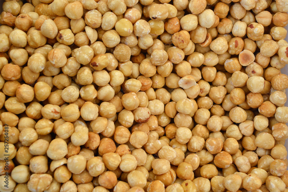 Texture of shelled hazelnuts in flat lay angle. Texture of shelled hazelnuts in flat lay angle.