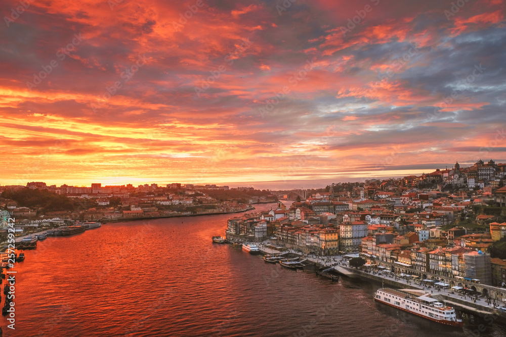  Panorama of the city of Porto  in Portugal and the Douro River in the evening at sunset, top view