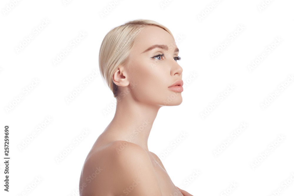 Perfect clean skin of a woman, a cosmetic for wrinkles. Rejuvenating effect on the skin care. Clean pores no wrinkles. Girl blonde on white background isolate, copy space. Healthy face skin