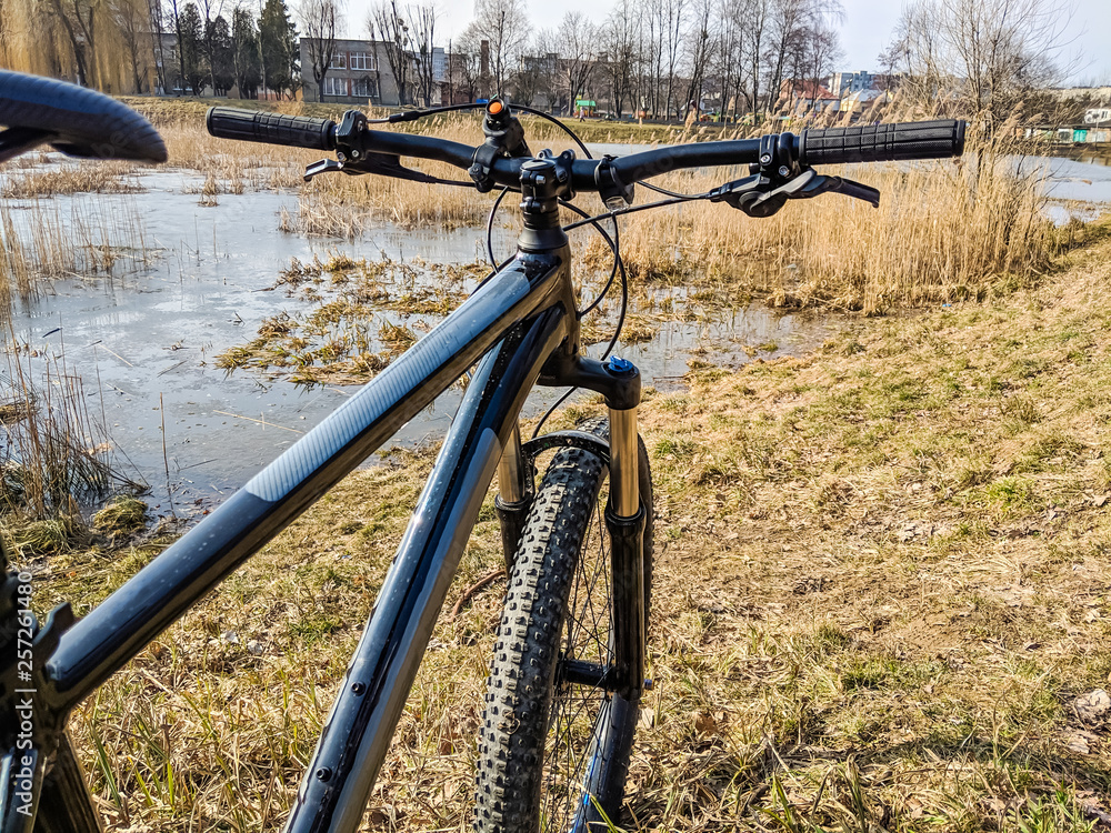 MTB bicycle on the trail in the spring season MTB bicycle on the trail in the spring season