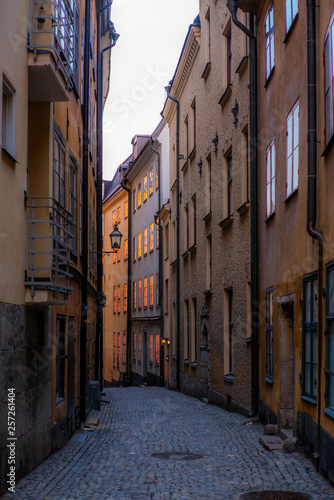 Old cobbled narrow street with colorful houses in Stockholm in the morning - 10 © gdefilip