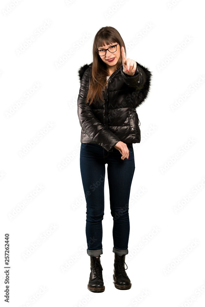 Full-length shot of Woman with glasses showing and lifting a finger Full-length shot of Woman with glasses showing and lifting a finger
