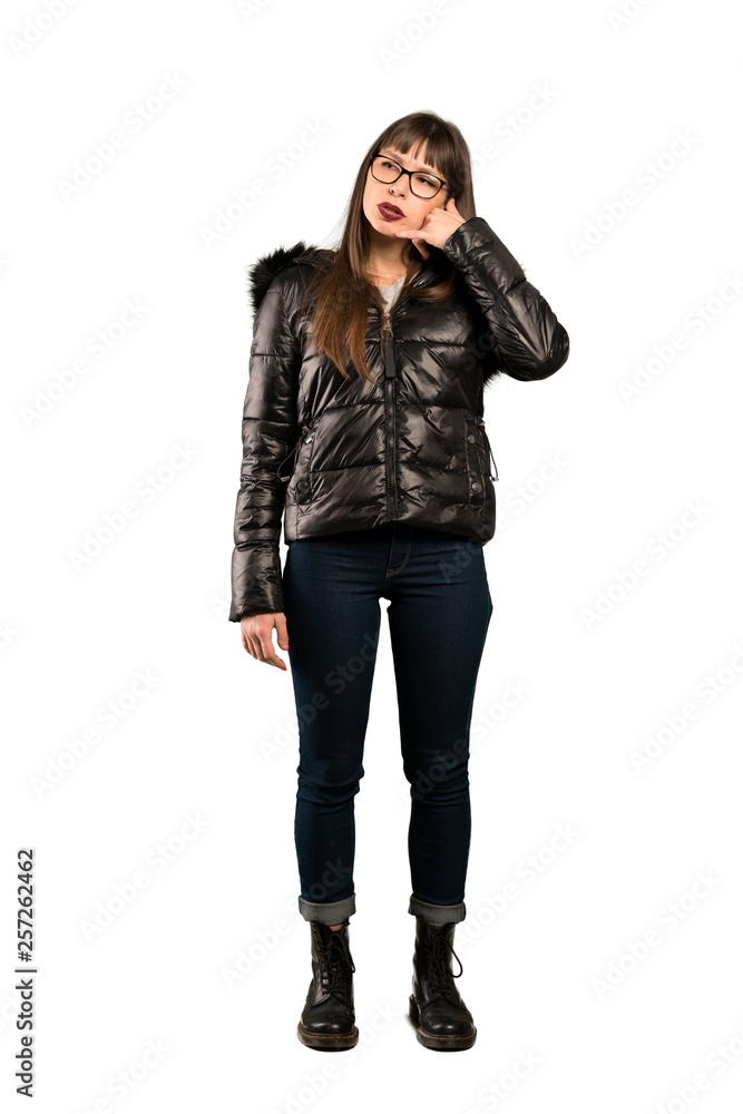 Full-length shot of Woman with glasses making phone gesture. Call me back sign Full-length shot of Woman with glasses making phone gesture. Call me back sign