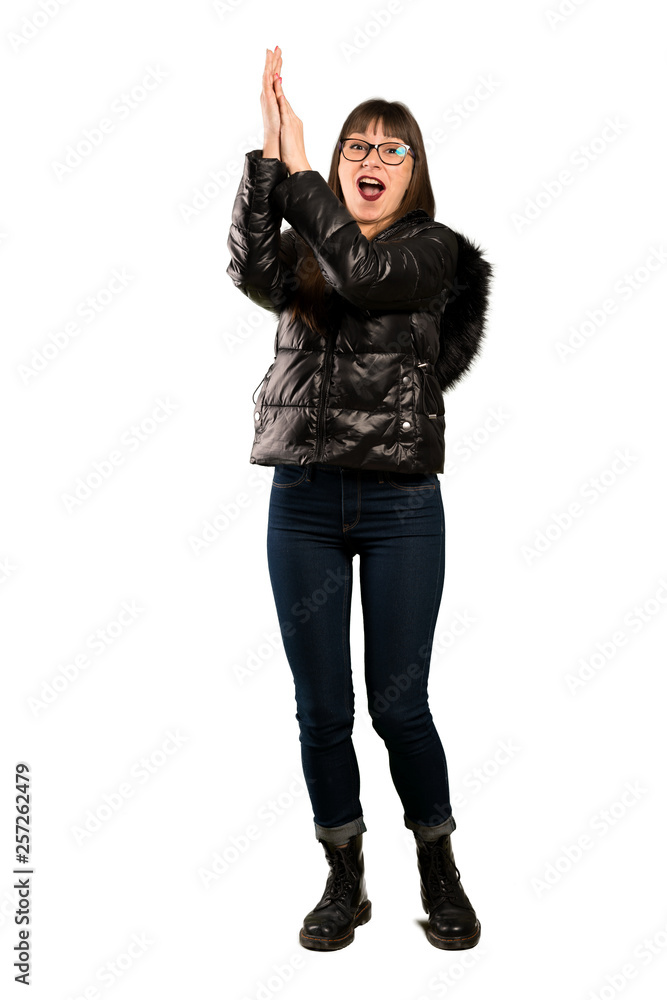 Full-length shot of Woman with glasses applauding after presentation in a conference Full-length shot of Woman with glasses applauding after presentation in a conference