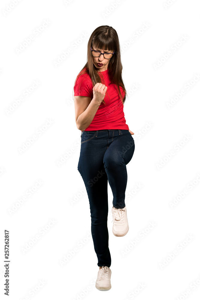 Full-length shot of Woman with glasses celebrating a victory in winner position Full-length shot of Woman with glasses celebrating a victory in winner position