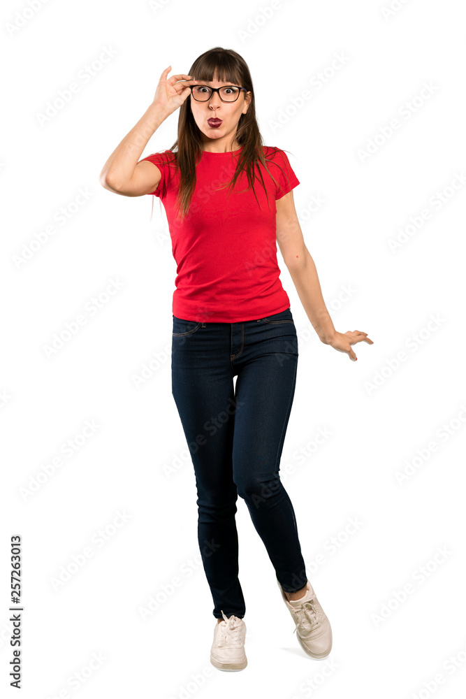 Full-length shot of Woman with glasses with glasses and surprised Full-length shot of Woman with glasses with glasses and surprised