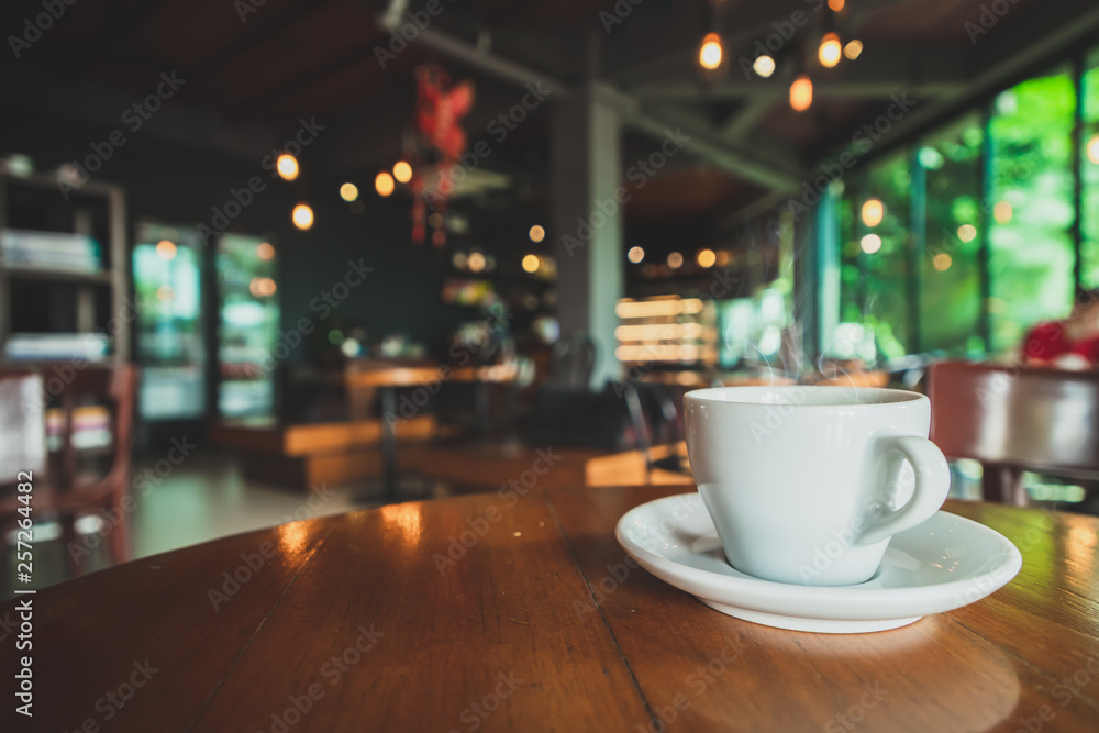 closeup white coffee mug in coffee shop closeup white coffee mug in coffee shop