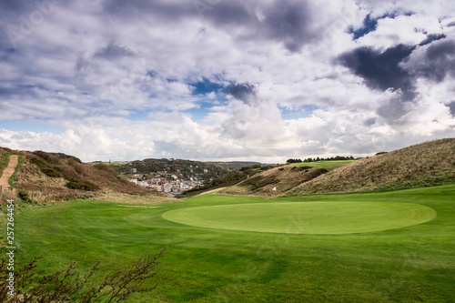 Golf course in Etretat  green grass  vacation. Normandy  France  Europe
