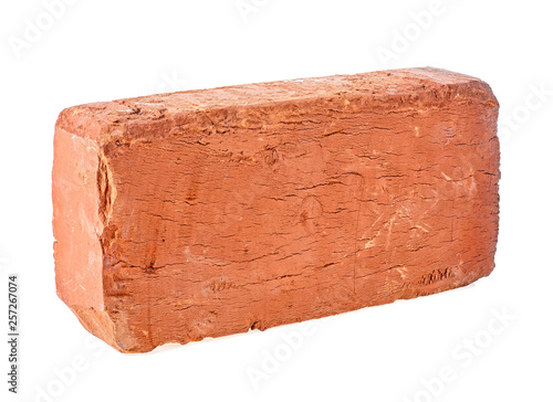 Red brick isolated on a white background © domnitsky