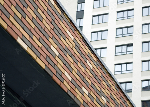 brick wall on the background of a building with Windows
