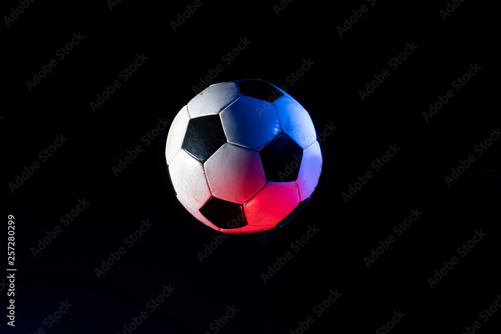 soccer ball isolated on the black.
