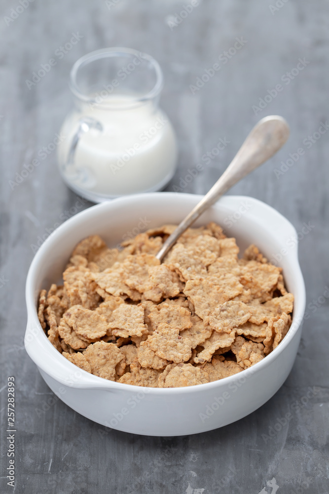 cereals in white bowl with milk cereals in white bowl with milk