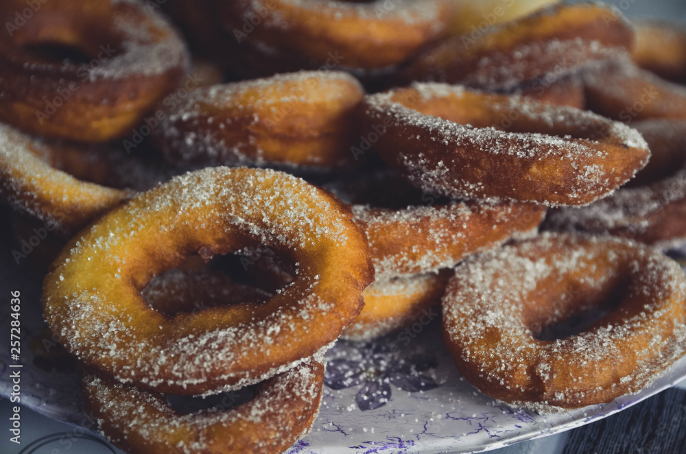 Homemade donuts with sugar on top Homemade donuts with sugar on top
