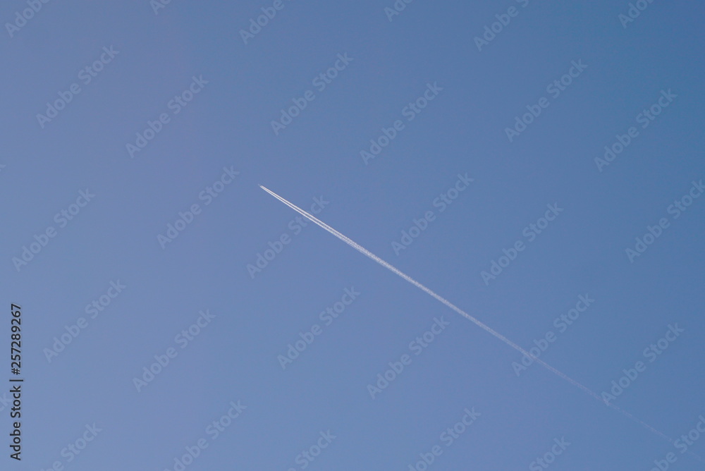 Flying Airplane On The Blue Sky Flying Airplane On The Blue Sky