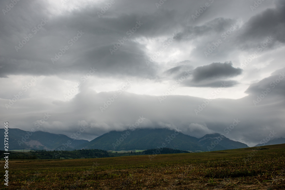 Obraz premium storm clouds over fields in slovakia