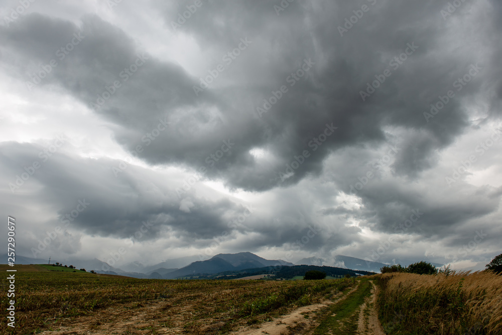 storm clouds over fields in slovakia storm clouds over fields in slovakia