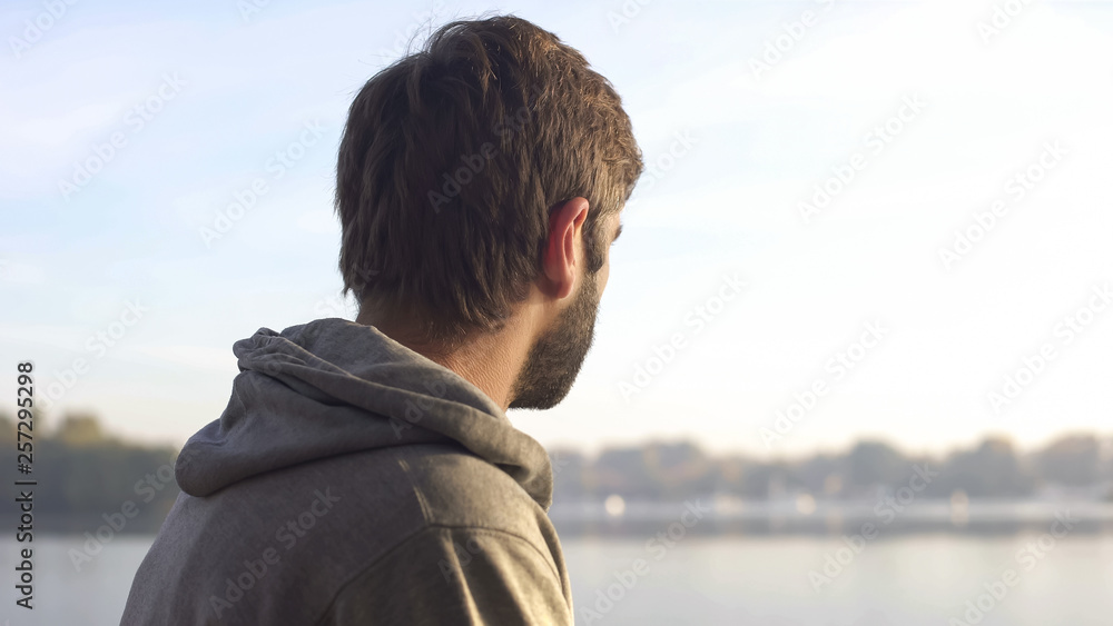 Man enjoying beautiful view during morning jogging, person and nature unity