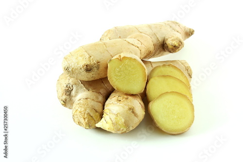 Fresh ginger root and ginger slice isolated on white background
