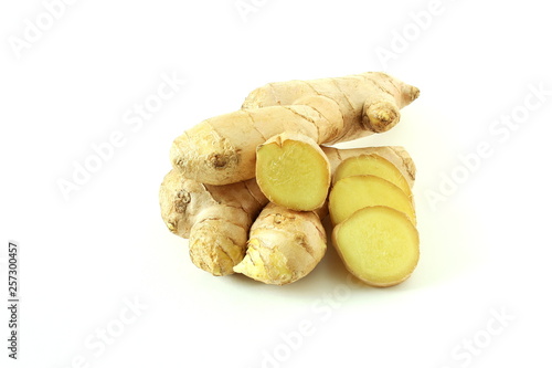 Fresh ginger root and ginger slice isolated on white background