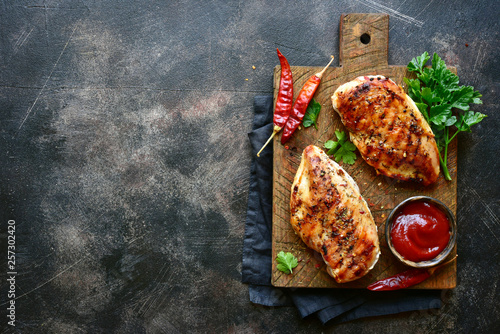 Tableau sur toile Grilled spicy chicken breast with ketchup