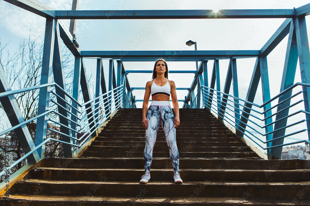 Sporty woman in urban environment Sporty woman in urban environment