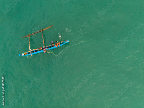 Fishermen Sri Lanka boat throw the net into the water