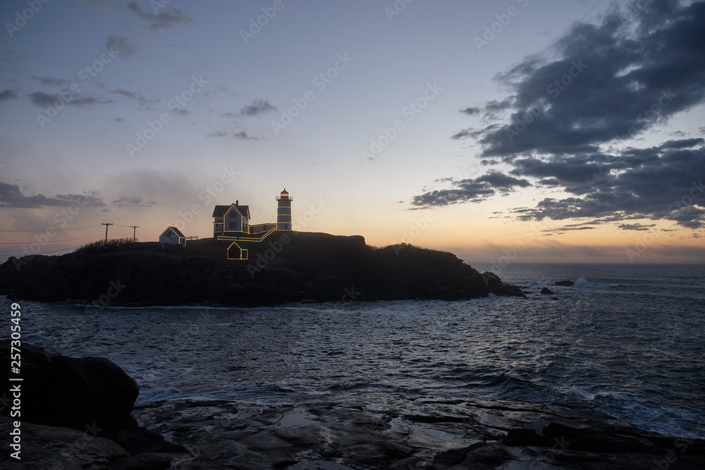 Early dawn at the Nubble Lighthouse off the Maine Coast
