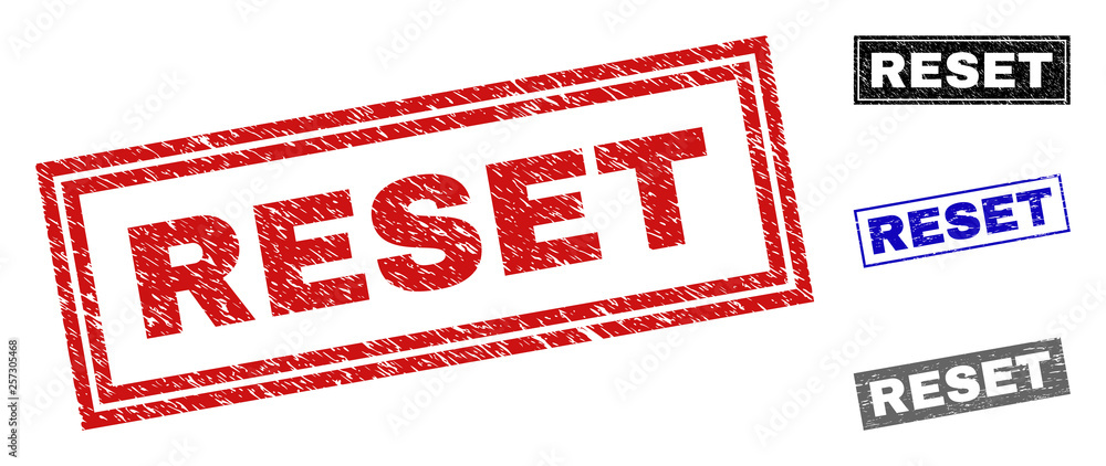 Grunge RESET rectangle stamp seals isolated on a white background. Rectangular seals with grunge texture in red, blue, black and gray colors. Grunge RESET rectangle stamp seals isolated on a white background. Rectangular seals with grunge texture in red, blue, black and gray colors.