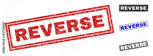 Grunge REVERSE rectangle stamp seals isolated on a white background. Rectangular seals with grunge texture in red, blue, black and gray colors.