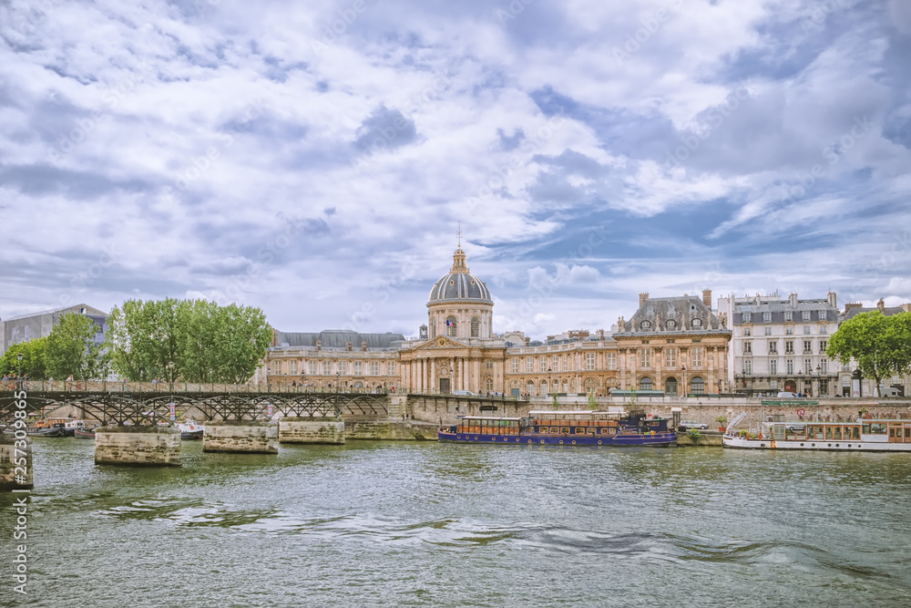 Paris. The Pont des Arts and Institut de France. View from right bank of the Seine river.