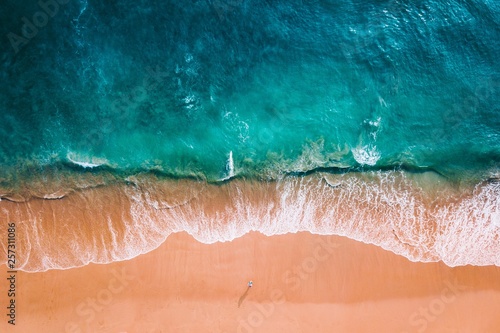 Fototapeta Naklejka Na Ścianę i Meble -  Aerial shot of ocean and beach