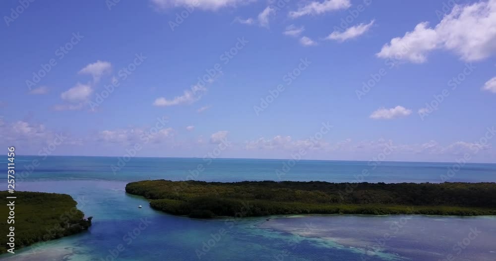 AERIAL: lifting over an empty sand bank in Key Largo to reveal more of the terrain. AERIAL: lifting over an empty sand bank in Key Largo to reveal more of the terrain.