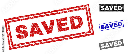 Grunge SAVED rectangle stamp seals isolated on a white background. Rectangular seals with grunge texture in red, blue, black and grey colors.