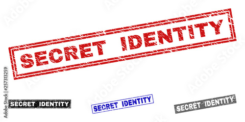 Grunge SECRET IDENTITY rectangle stamp seals isolated on a white background. Rectangular seals with grunge texture in red, blue, black and grey colors.
