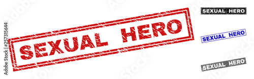 Grunge SEXUAL HERO rectangle stamp seals isolated on a white background. Rectangular seals with grunge texture in red, blue, black and grey colors.