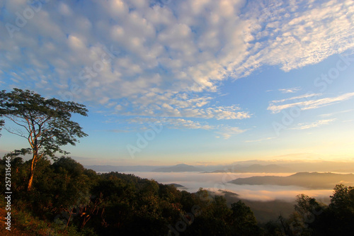 sea fog in the hills with beautiful sky background