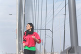Young sporty woman running