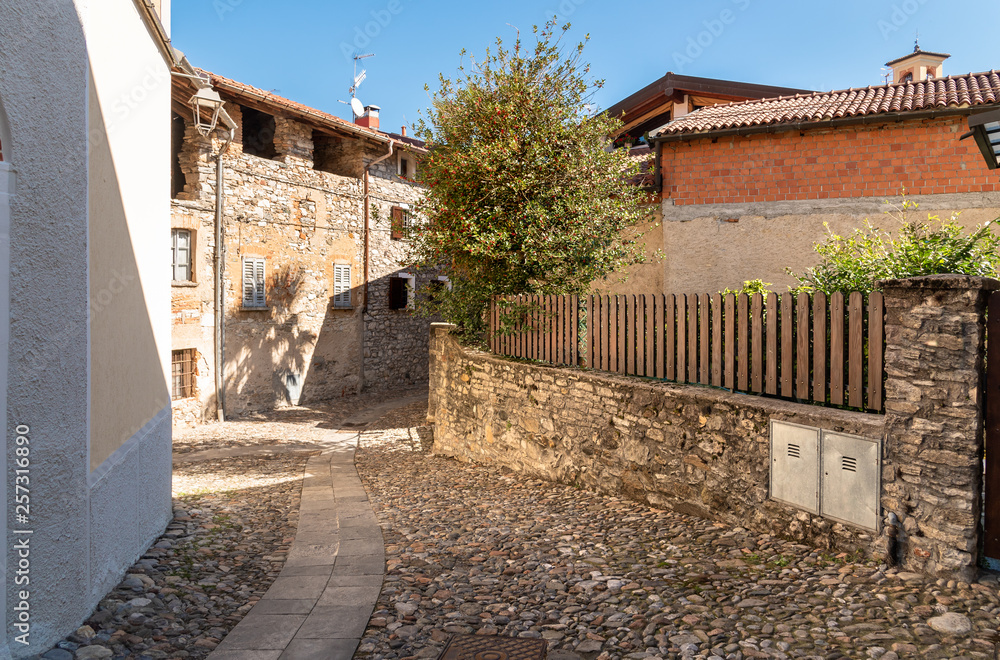 View of the small village Masciago Primo of Valcuvia with narrow streets and stone houses, located in the province of Varese, Lombardy, Italy