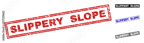 Grunge SLIPPERY SLOPE rectangle stamp seals isolated on a white background. Rectangular seals with grunge texture in red, blue, black and gray colors.