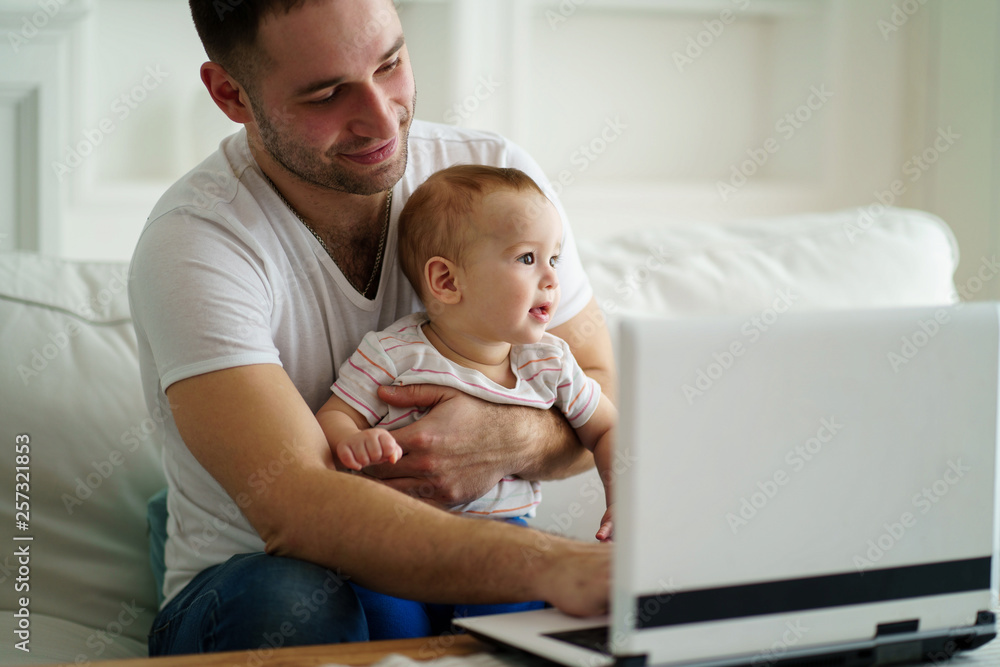 lifestyle of modern business father. young man babysitting working overtime at home office. daily routine of hardworking people. lifestyle of modern business father. young man babysitting working overtime at home office. daily routine of hardworking people.