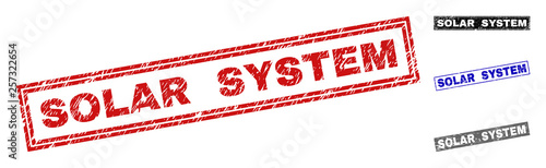 Grunge SOLAR SYSTEM rectangle stamp seals isolated on a white background. Rectangular seals with grunge texture in red, blue, black and grey colors.