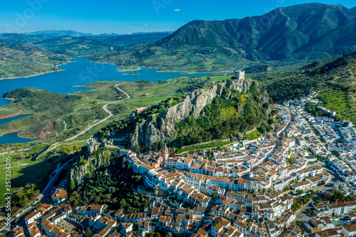 Obraz na plátne Zahara de la Sierra aerial view of medieval castle, hilltop village and lake nea