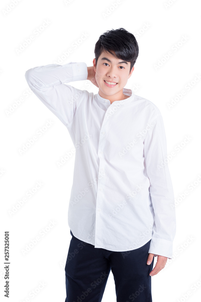 Young handsome man wearing white shirt standing and smiles over white background Young handsome man wearing white shirt standing and smiles over white background
