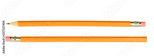 sharp and unsharp yellow pencils opposite direction isolated on white background..