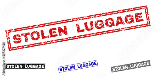 Grunge STOLEN LUGGAGE rectangle stamp seals isolated on a white background. Rectangular seals with grunge texture in red, blue, black and gray colors.
